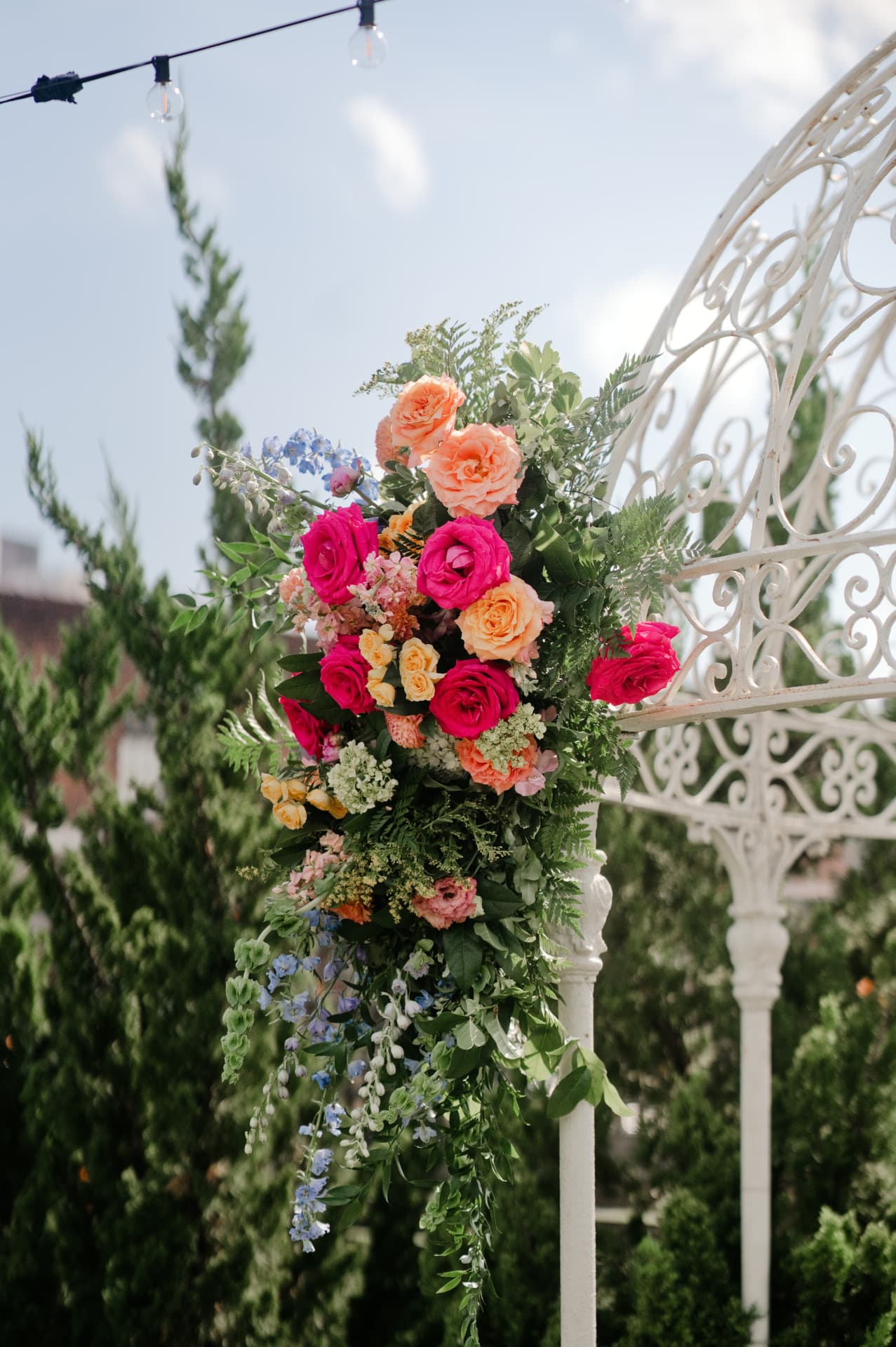 Florals cascading from a garden structure