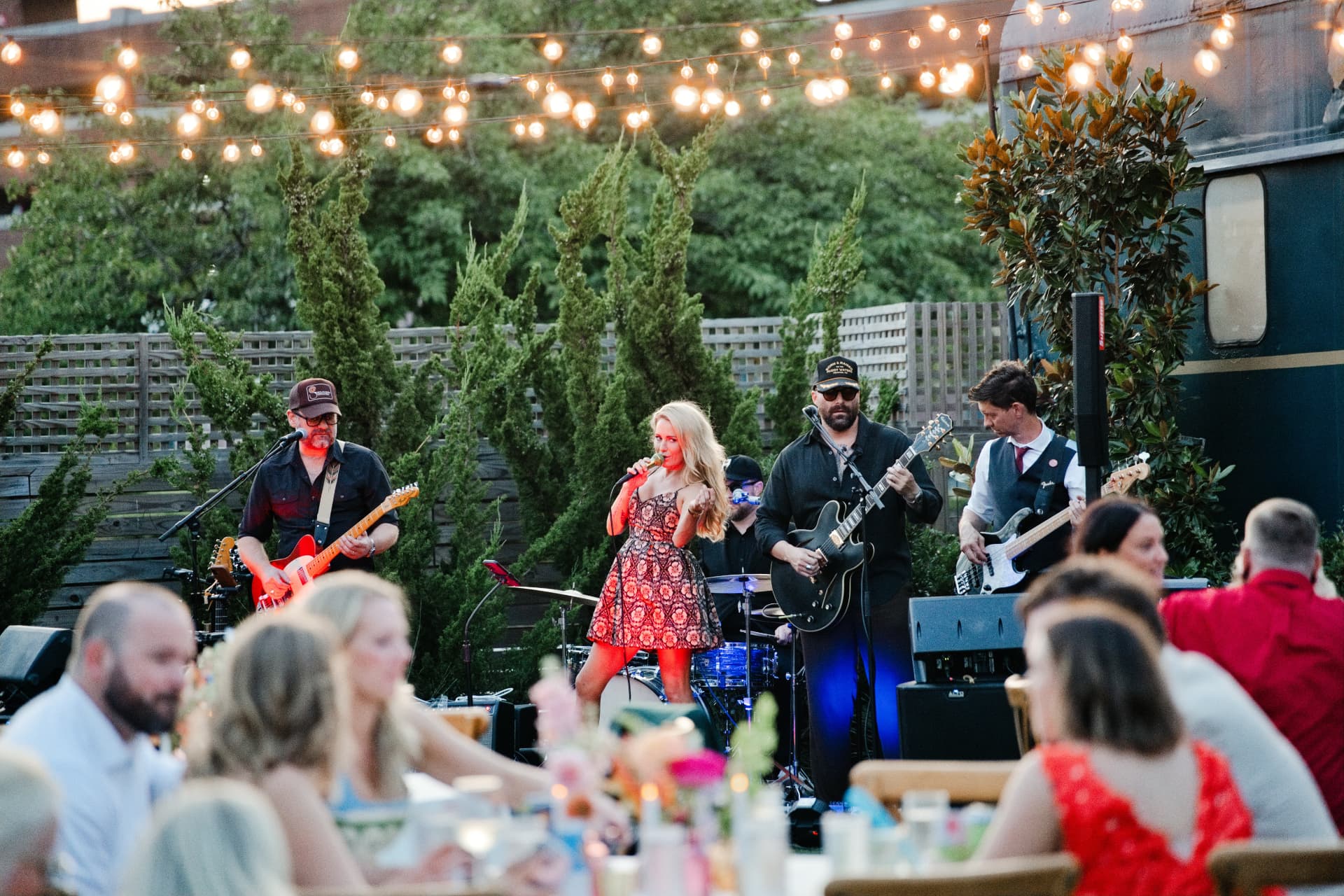 A live band performing at an outdoor reception