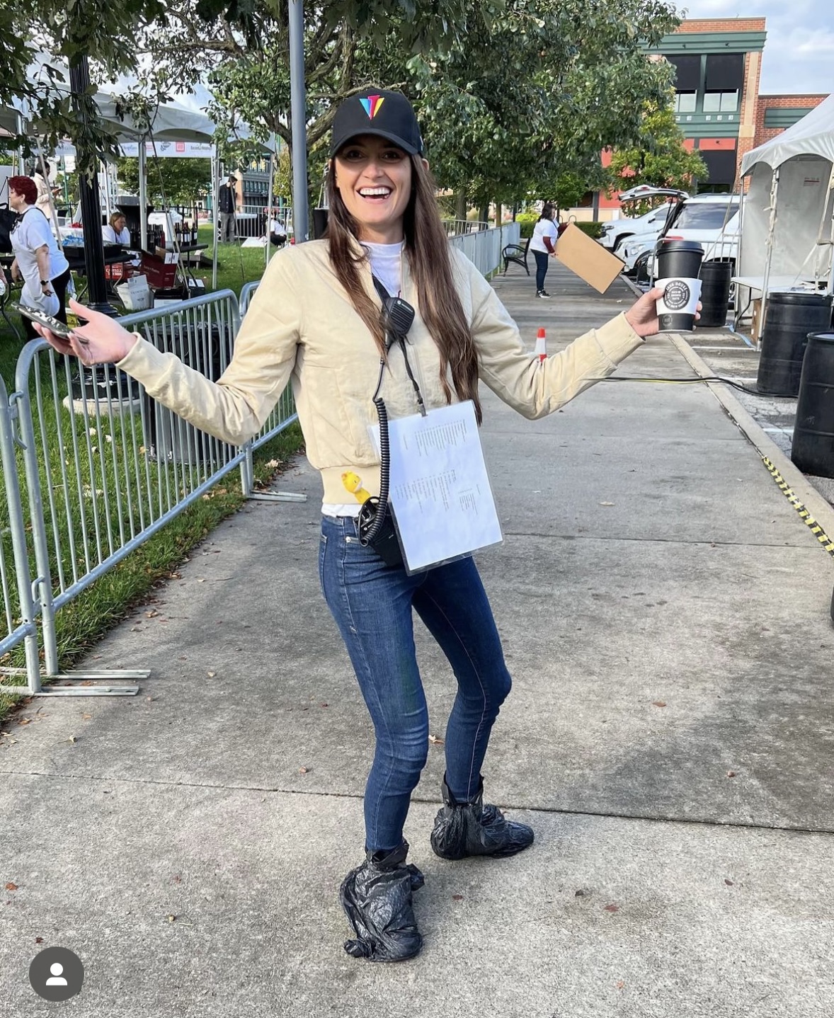 Ellie onsite managing an event with a headset